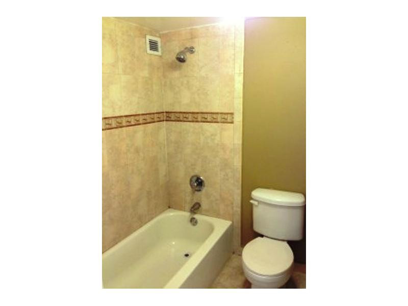 17021 North Bay Road, Unit 910 Sunny Isles Beach, FL 33160 - Photo 19 of 19 a bathroom with a toilet and a shower