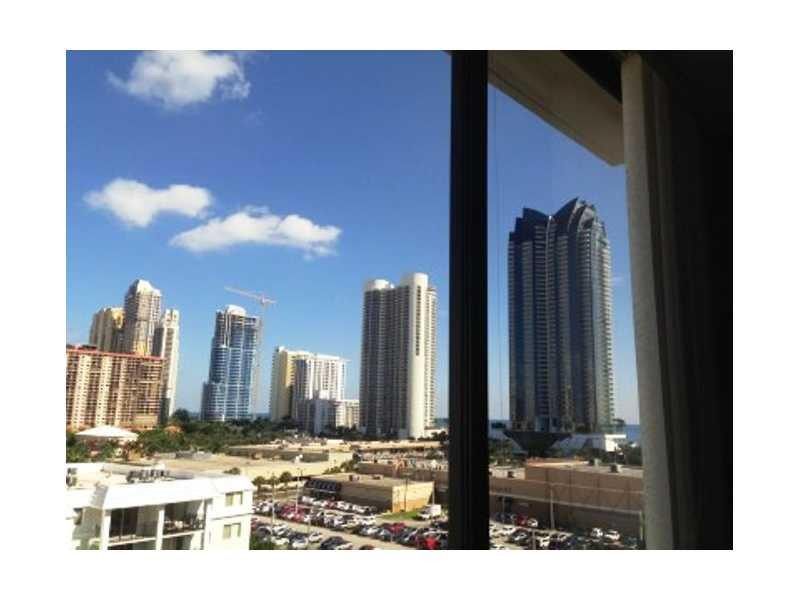 17021 North Bay Road, Unit 910 Sunny Isles Beach, FL 33160 - Photo 3 of 19 a view of a city with tall buildings