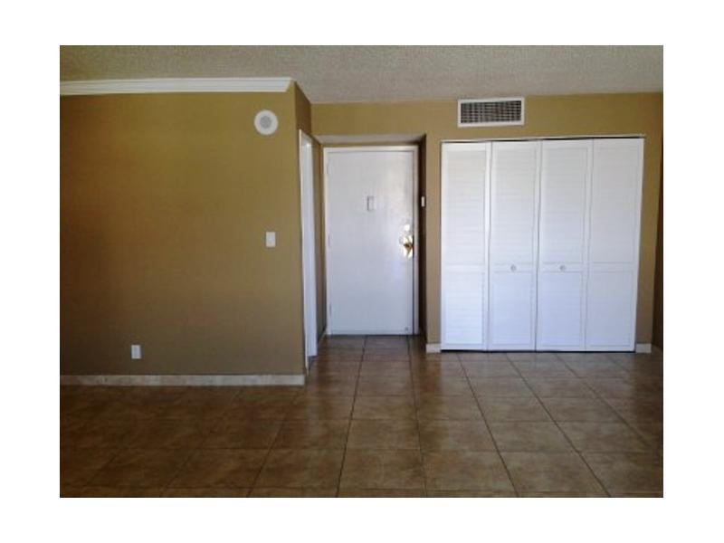 17021 North Bay Road, Unit 910 Sunny Isles Beach, FL 33160 - Photo 5 of 19 a view of an empty room with closet