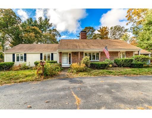 22 Bishops Lane Lynnfield, MA 01940 - Photo 1 of 31 a front view of a house with a yard