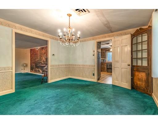 22 Bishops Lane Lynnfield, MA 01940 - Photo 11 of 31 a view of an empty room with kitchen and a window