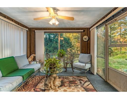 22 Bishops Lane Lynnfield, MA 01940 - Photo 20 of 31 a living room with furniture and a large window