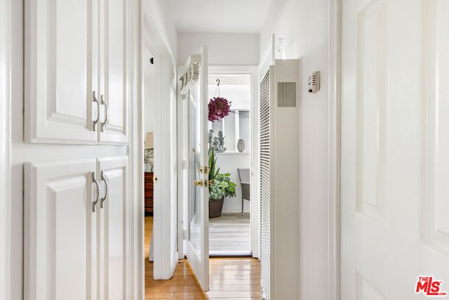 a view of a hallway and interior of the house
