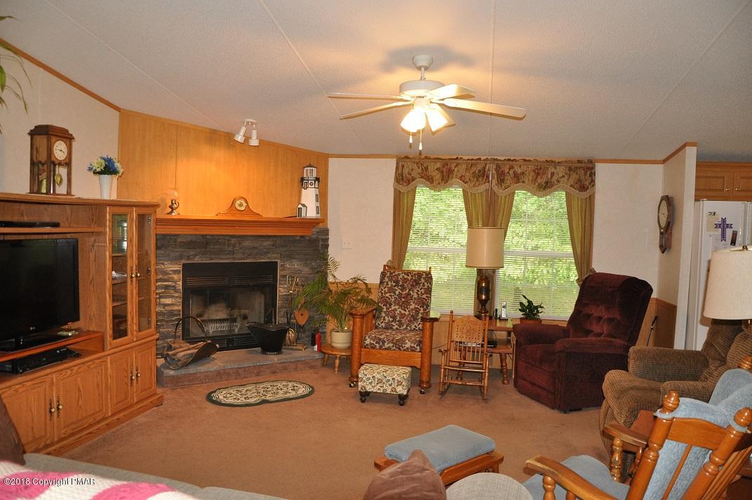 196 Fawn Valley Road Stroudsburg, PA 18360 - Photo 4 of 28 Living room from dining area