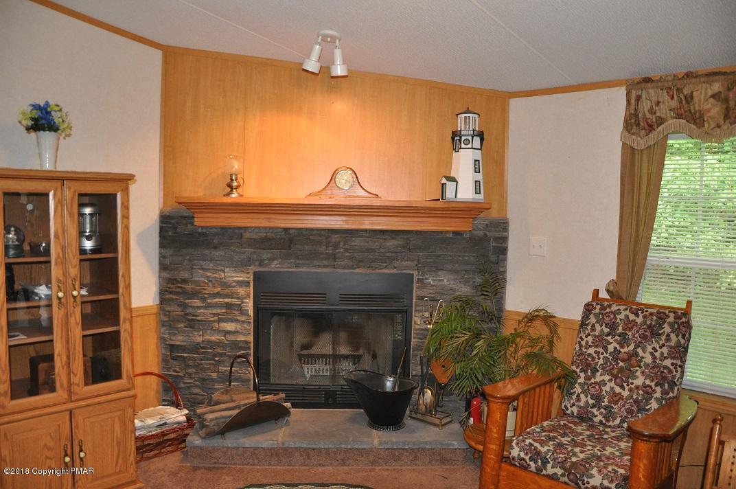 196 Fawn Valley Road Stroudsburg, PA 18360 - Photo 7 of 28 Living room with fireplace