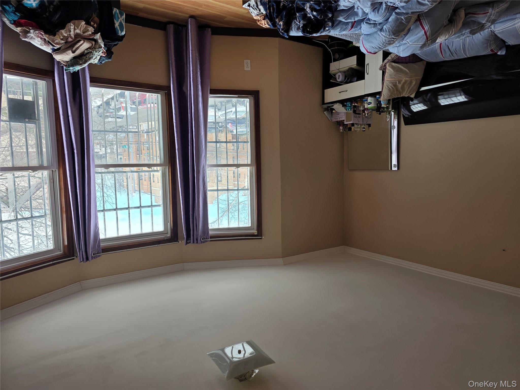 91-02 96th Street Queens, NY 11421 - Photo 7 of 12 a livingroom with window
