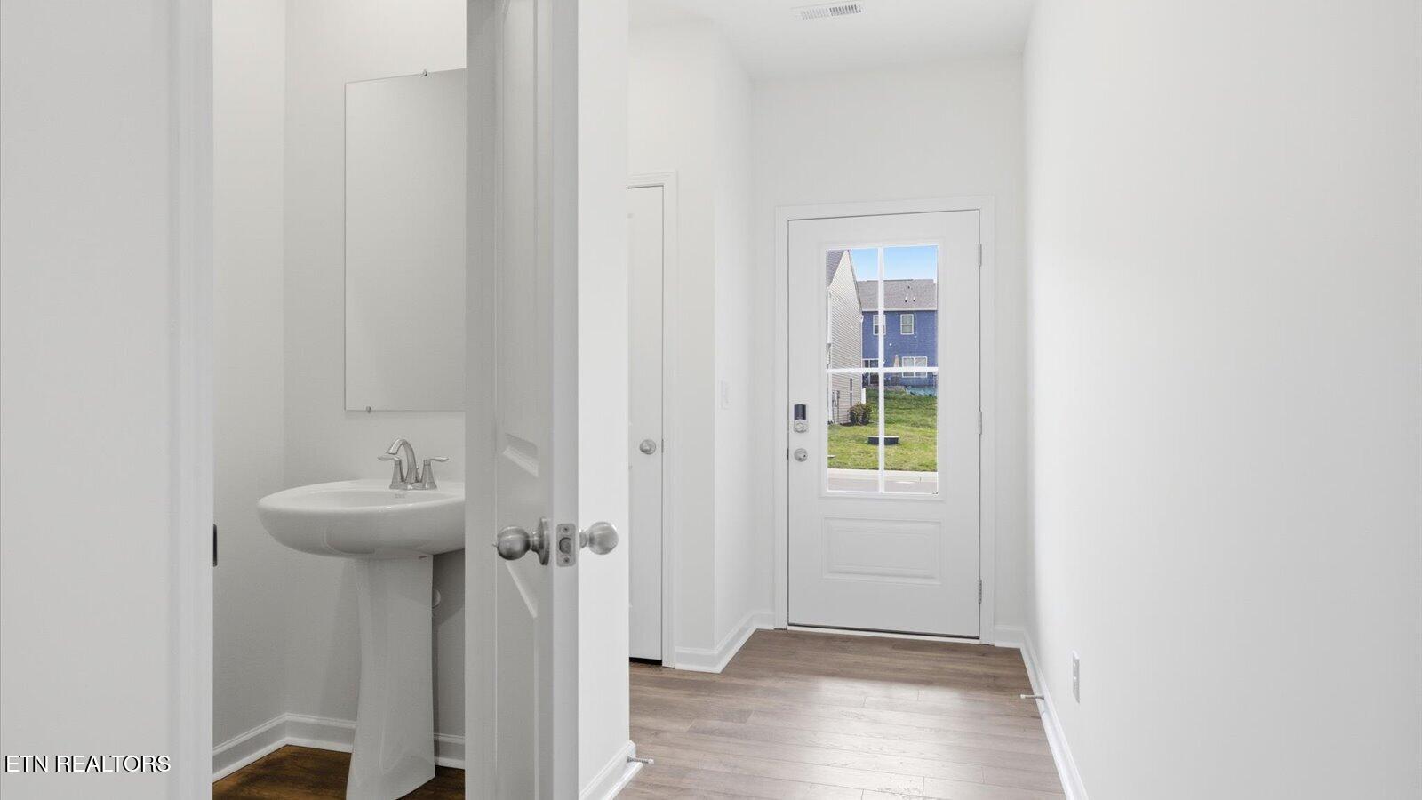 3771 Wyatt Way Kodak, TN 37764 - Photo 3 of 30 2-1 entry way and powder room