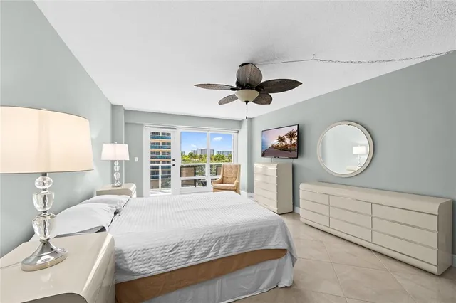 a bathroom with a double vanity sink mirror and shower