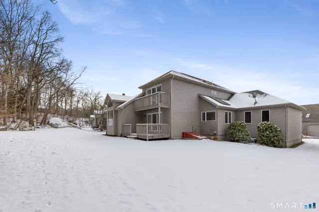 a picture of a bathroom with a shower