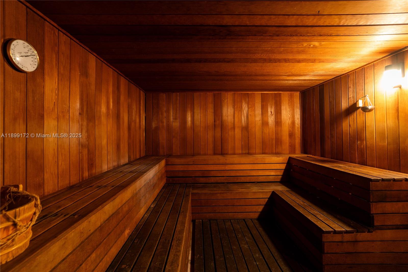 540 Brickell Key Drive, Unit 202 Miami, FL 33131 - Photo 34 of 60 a view of room with stairs and wooden floor