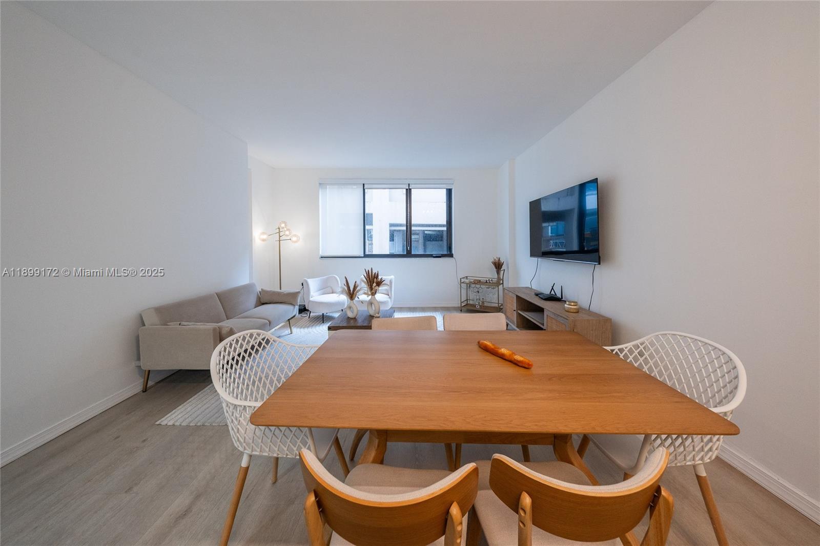 540 Brickell Key Drive, Unit 202 Miami, FL 33131 - Photo 54 of 60 a view of a dining room with furniture
