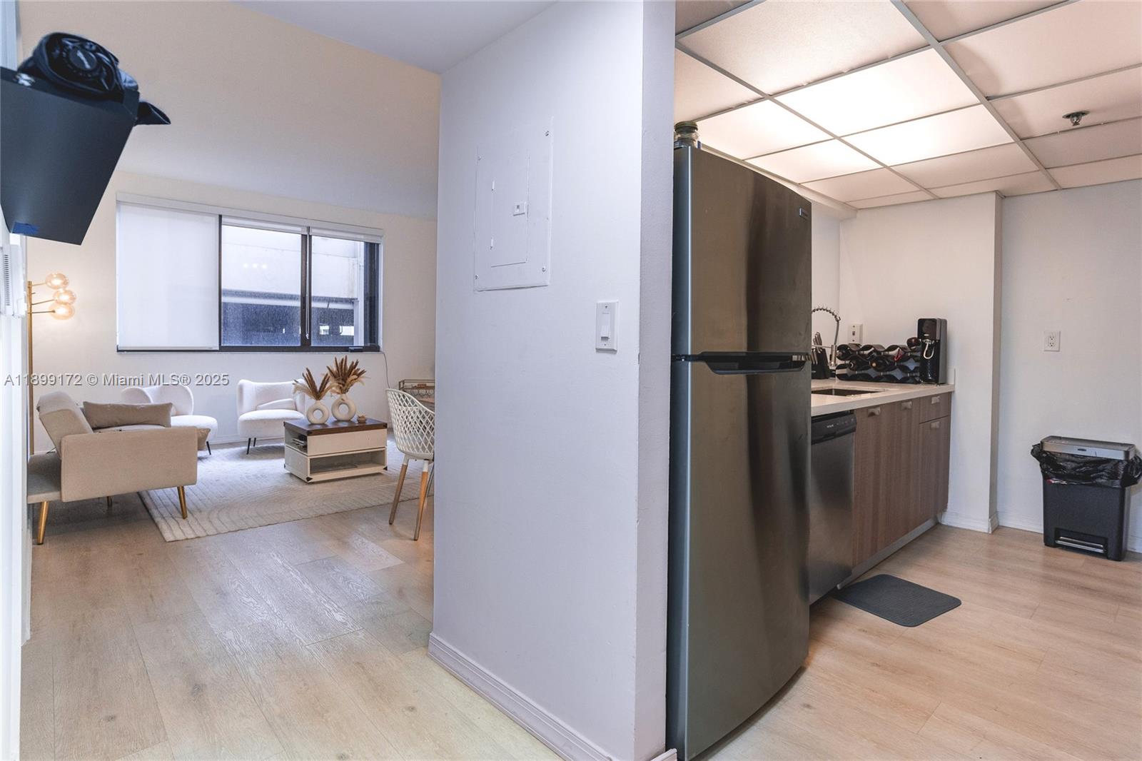 540 Brickell Key Drive, Unit 202 Miami, FL 33131 - Photo 60 of 60 a kitchen with a refrigerator and a stove