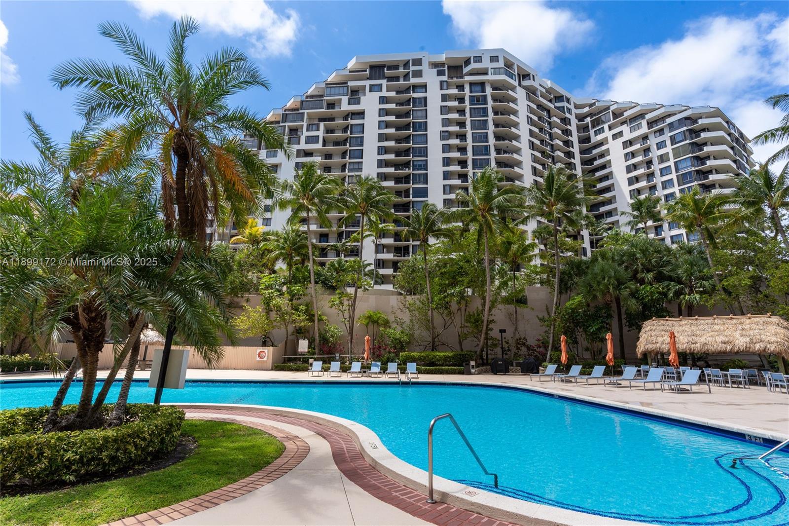 540 Brickell Key Drive, Unit 202 Miami, FL 33131 - Photo 10 of 60 a view of a swimming pool with a patio