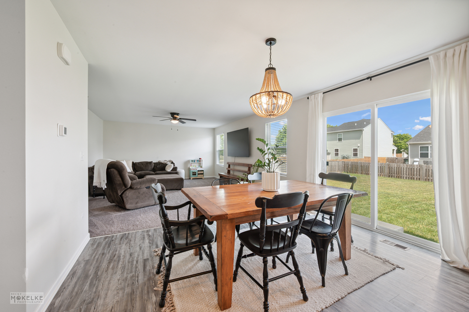 1024 Daniel Street Plano, IL 60545 - Photo 15 of 27 a view of a dining room with furniture window and wooden floor