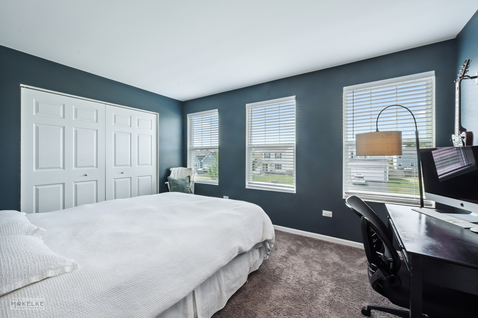 1024 Daniel Street Plano, IL 60545 - Photo 19 of 27 a bedroom with a bed window and a desk