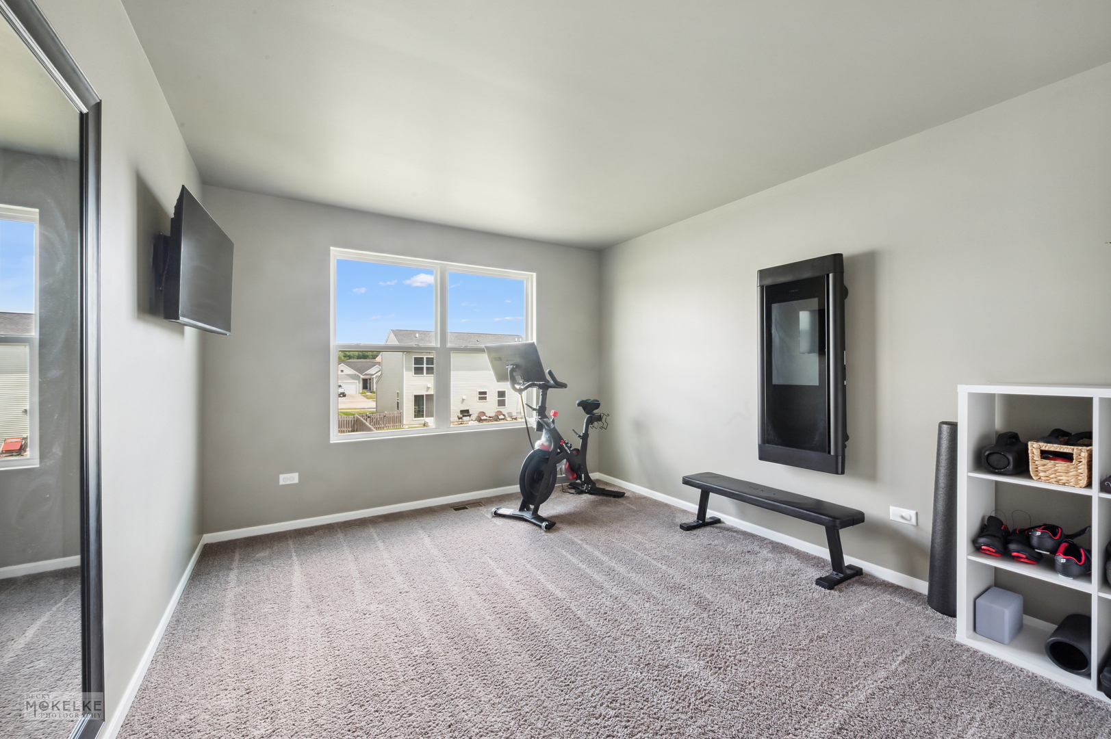 1024 Daniel Street Plano, IL 60545 - Photo 21 of 27 a view of a room with gym equipment and a window