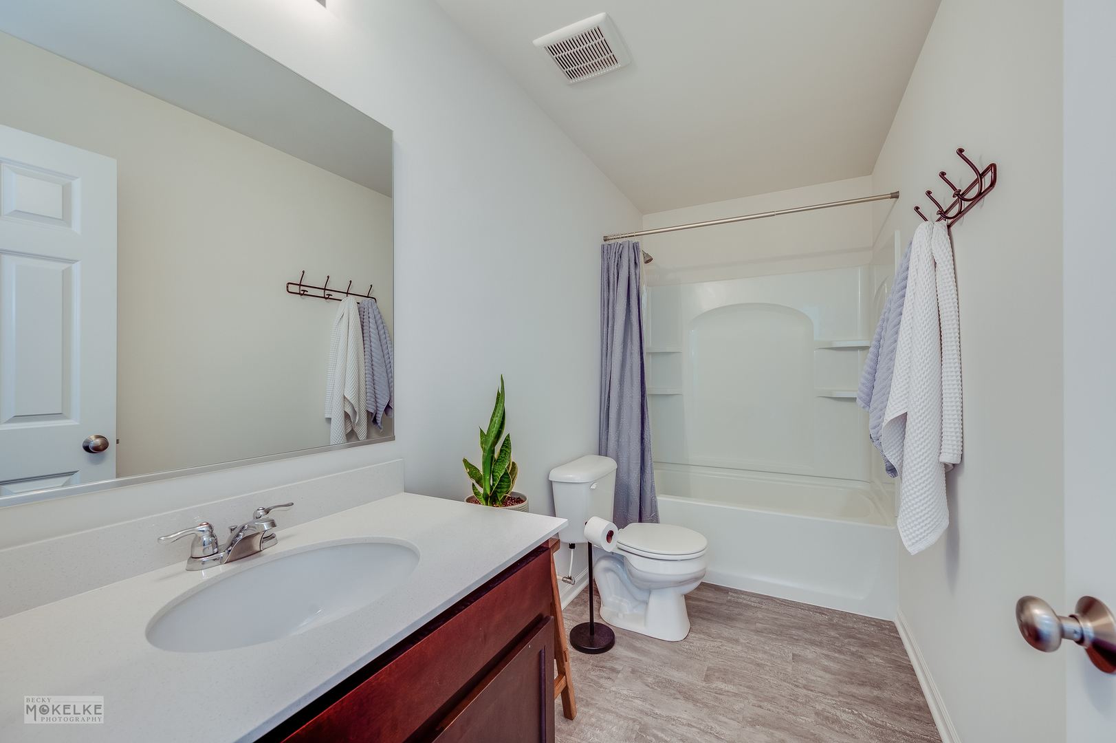 1024 Daniel Street Plano, IL 60545 - Photo 22 of 27 a bathroom with a sink toilet and shower