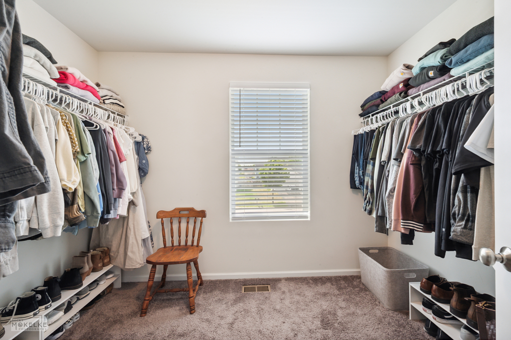 1024 Daniel Street Plano, IL 60545 - Photo 26 of 27 a view of walk in closet with clothes and shoes