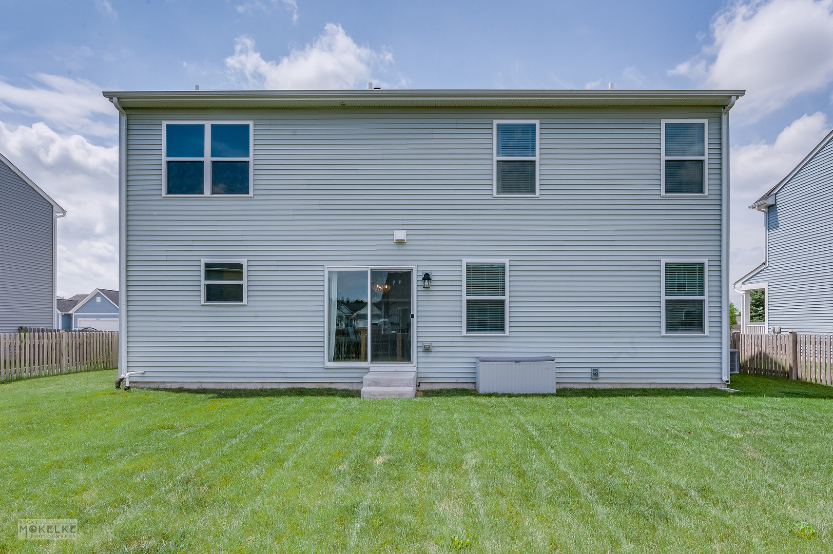 1024 Daniel Street Plano, IL 60545 - Photo 6 of 27 a front view of a house with garden