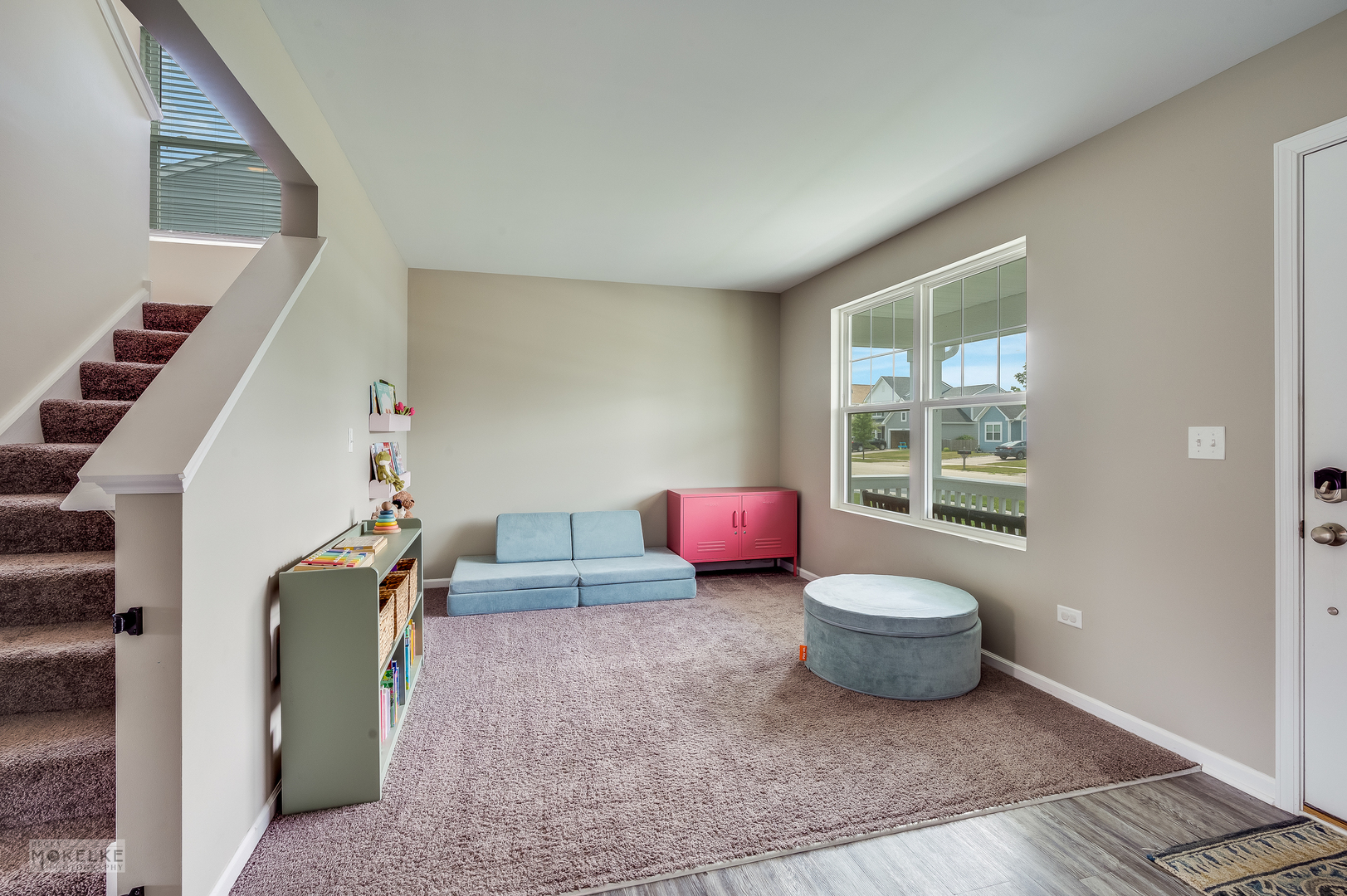 1024 Daniel Street Plano, IL 60545 - Photo 9 of 27 a living room with furniture and a window