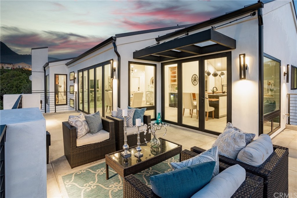 447 Avenida Crespi San Clemente, CA 92672 - Photo 11 of 42 a living room with furniture and floor to ceiling windows