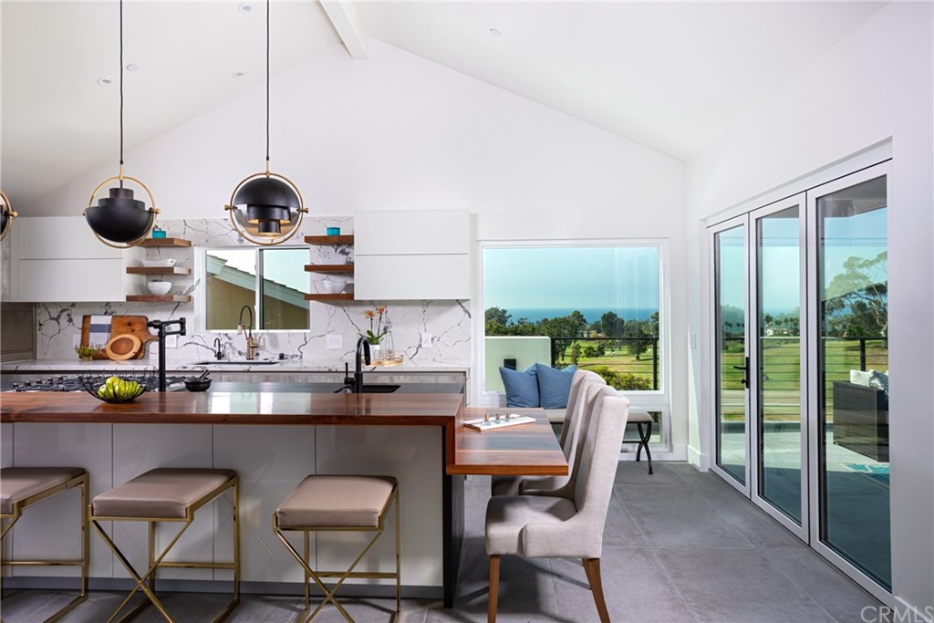 447 Avenida Crespi San Clemente, CA 92672 - Photo 18 of 42 a kitchen with a table and chairs in it