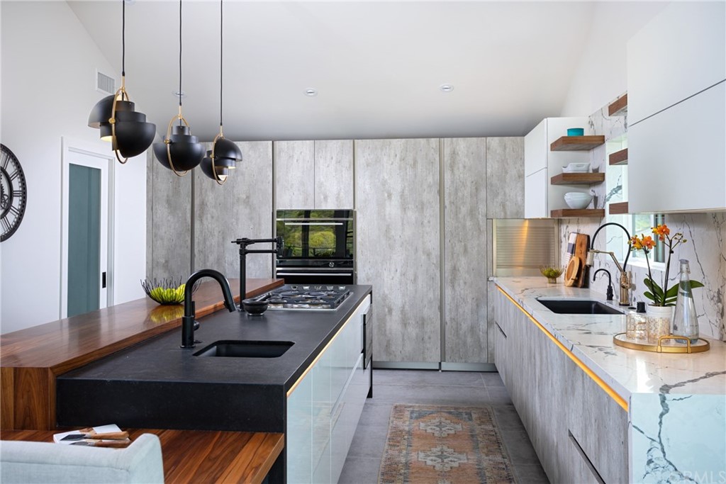 447 Avenida Crespi San Clemente, CA 92672 - Photo 20 of 42 a kitchen with furniture a sink a counter and a window