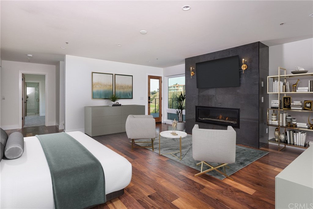447 Avenida Crespi San Clemente, CA 92672 - Photo 22 of 42 a bed room with a bed and a fireplace