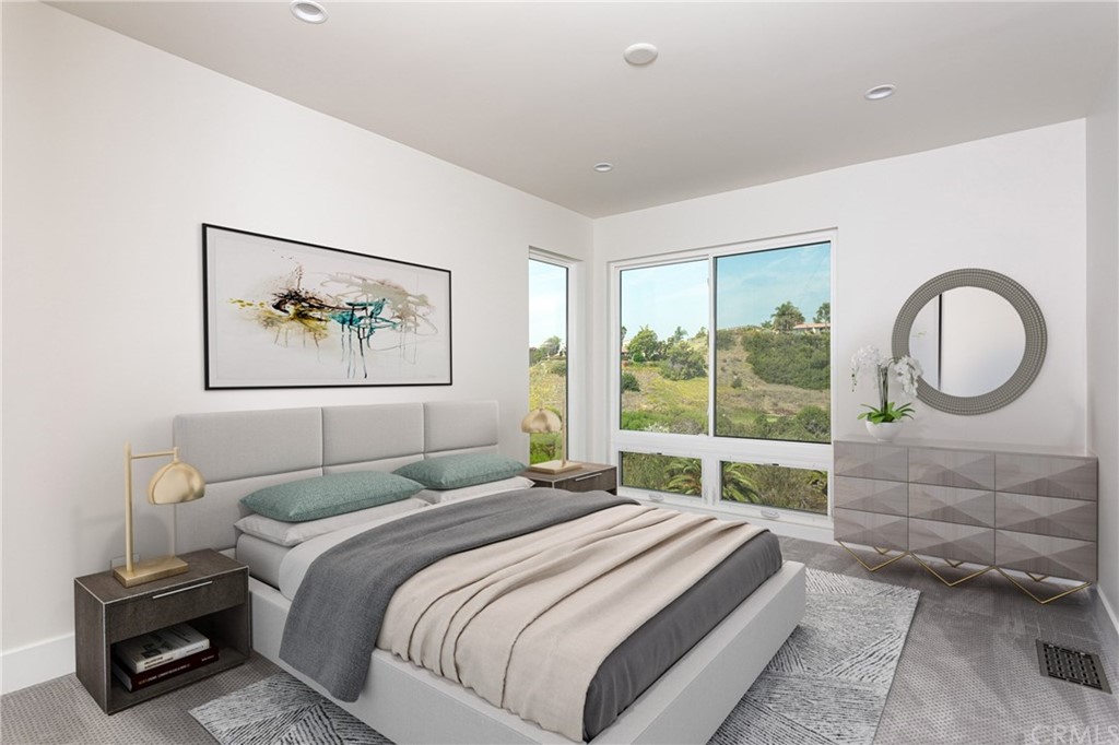 447 Avenida Crespi San Clemente, CA 92672 - Photo 34 of 42 a bedroom with a bed a mirror and a large window