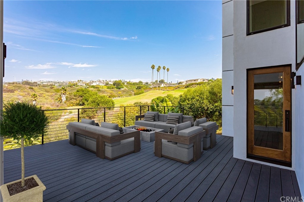 447 Avenida Crespi San Clemente, CA 92672 - Photo 36 of 42 a living room with furniture and a fireplace