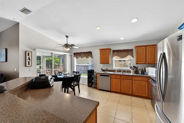a dining room with furniture and window