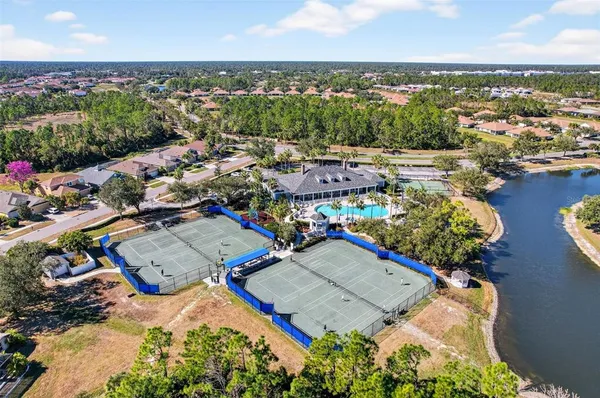 an aerial view of a swimming pool patio and mountain view