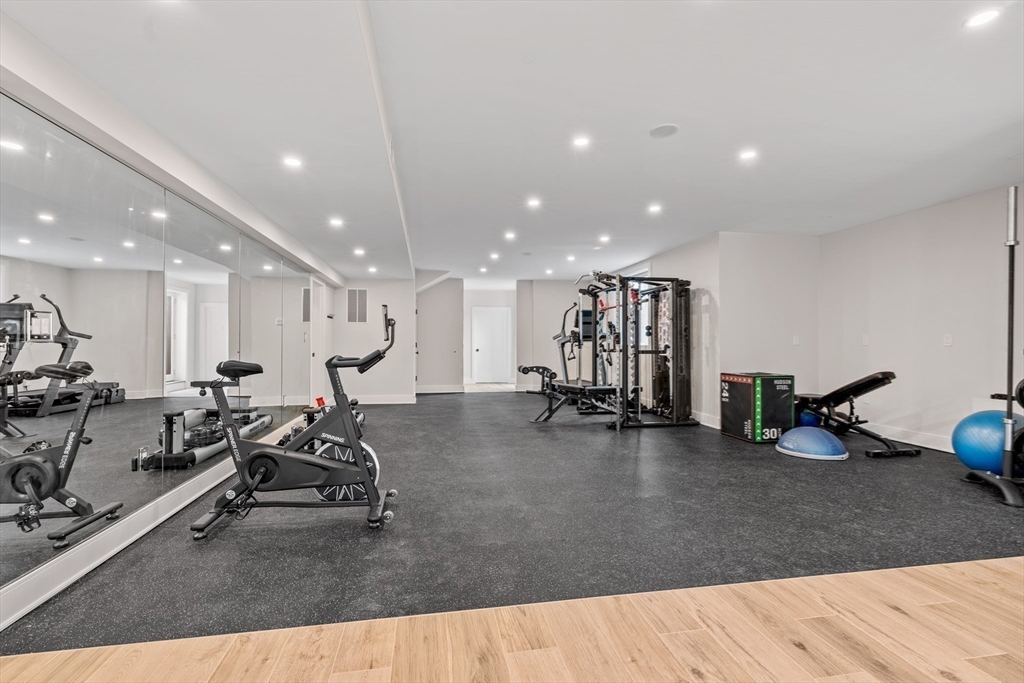 5 Colonial Road, Unit 5 Needham, MA 02492 - Photo 31 of 35 a view of a room with gym equipment