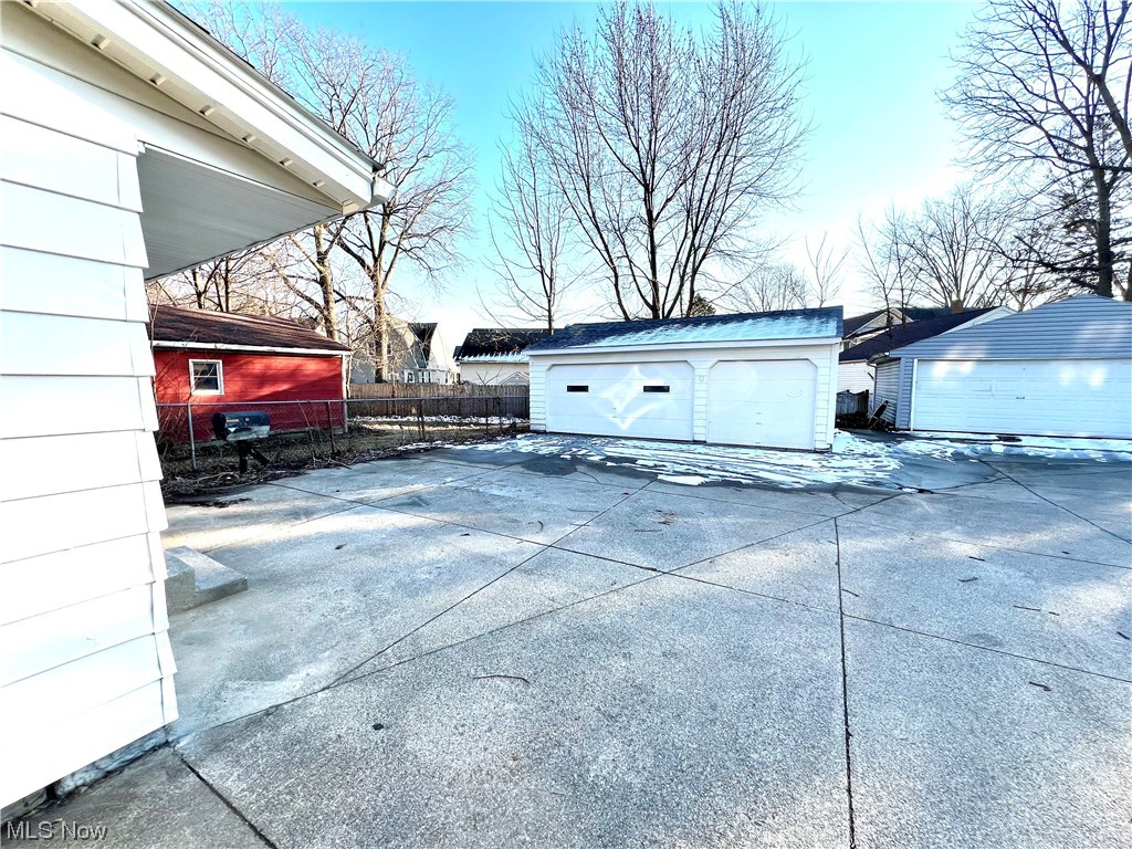 3527 Broadview Road Cleveland, OH 44109 - Photo 29 of 29 View of side of home with an outdoor structure and a garage