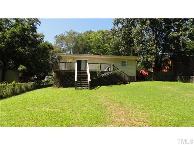 821 Carlisle Street Raleigh, NC 27610 - Photo 20 of 20 Oversized Deck in back and notice the Side Deck on the right.