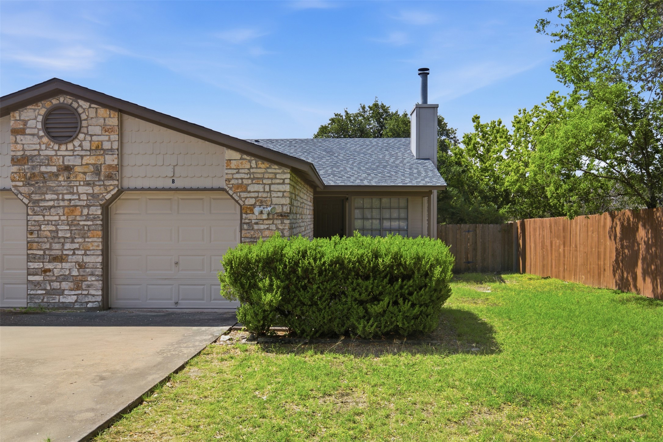 11611 Rustic Rock Drive, Unit B Austin, TX 78750 - Photo 2 of 30 Attached one car garage