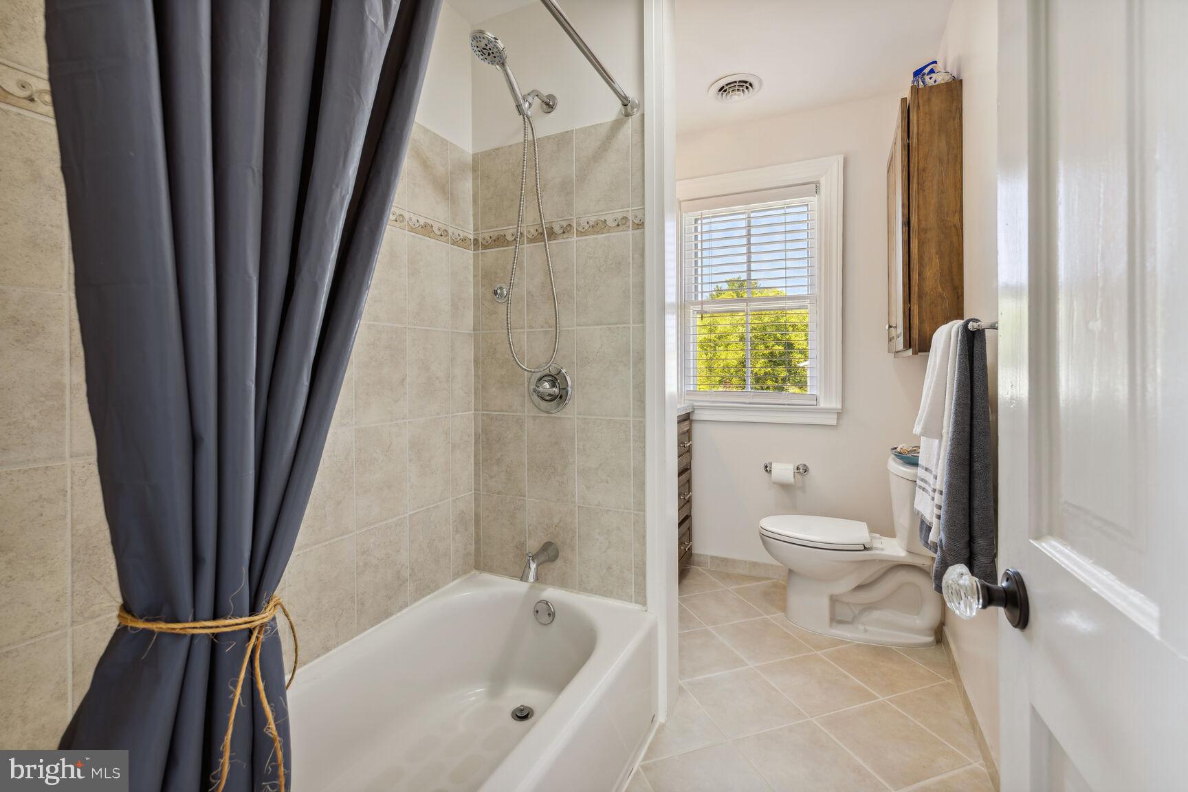 621 Uniontown Road Westminster, MD 21158 - Photo 14 of 25 Main Bath with Tile Tub area and floors