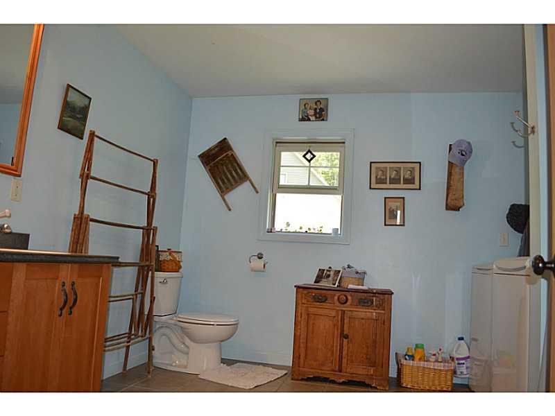 8 Beech Ridge Lane Otis, ME 04605 - Photo 24 of 34 Bathroom. Common bath with washer dryer