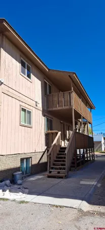 a front view of a house with garage