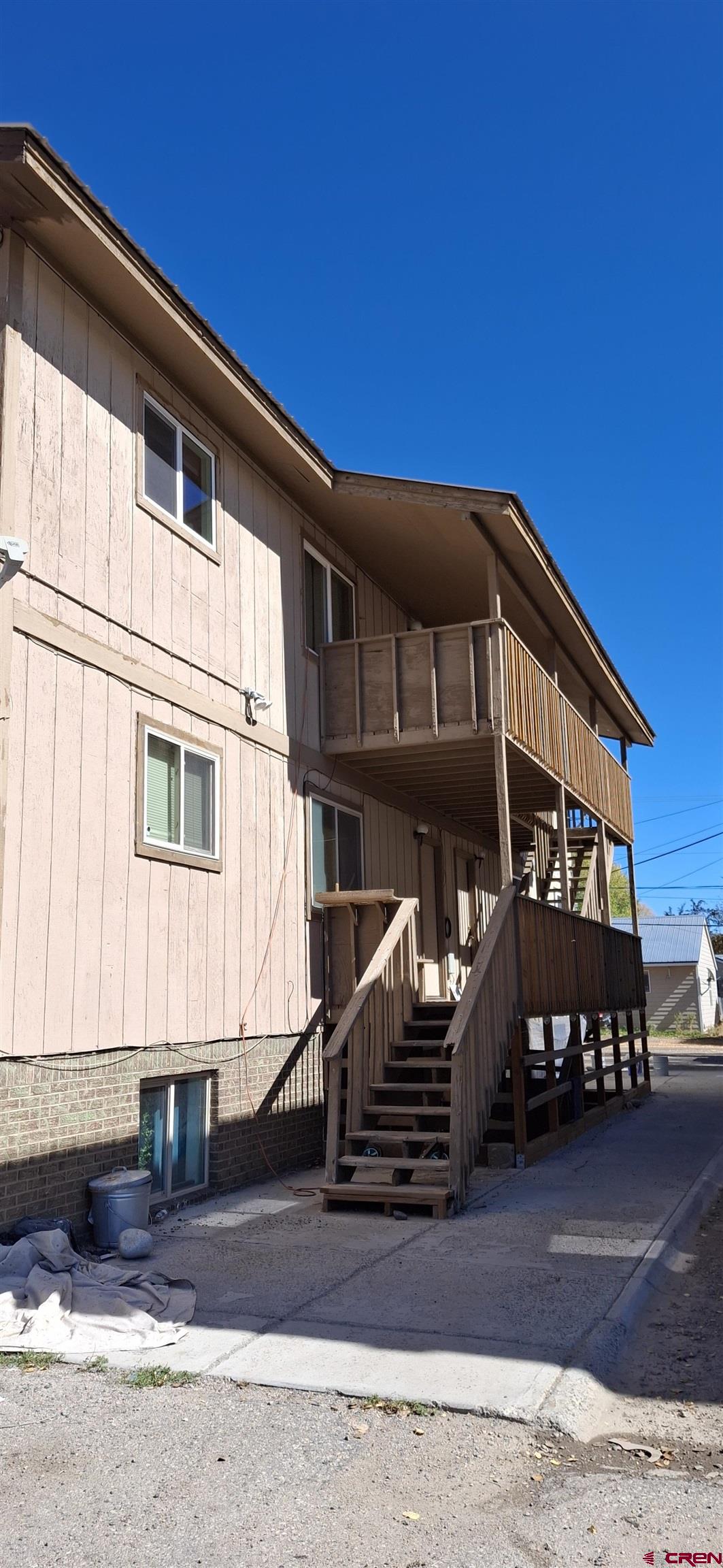 a front view of a house with garage