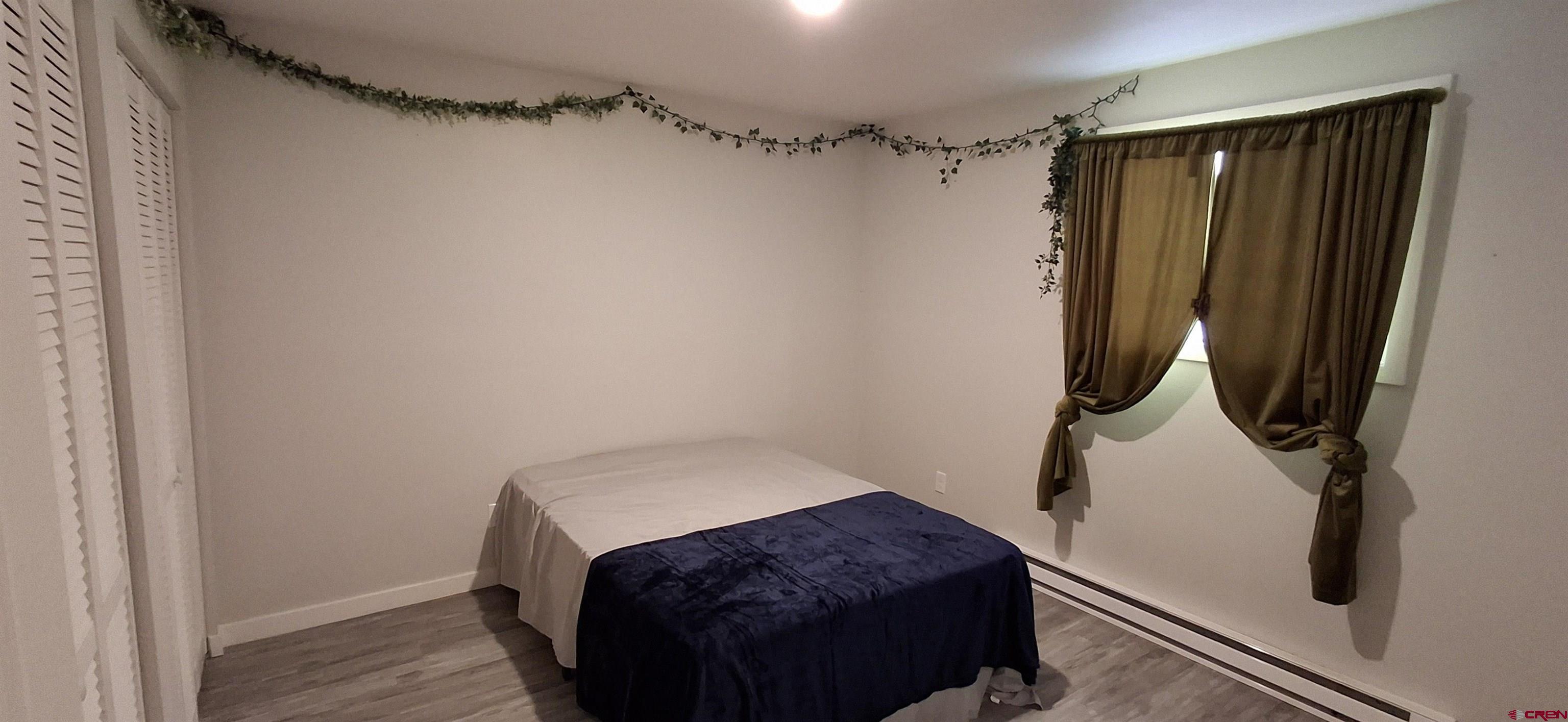 306 North 9th Street, Unit 1B Gunnison, CO 81230 - Photo 7 of 8 a bathroom with a sink and a shower