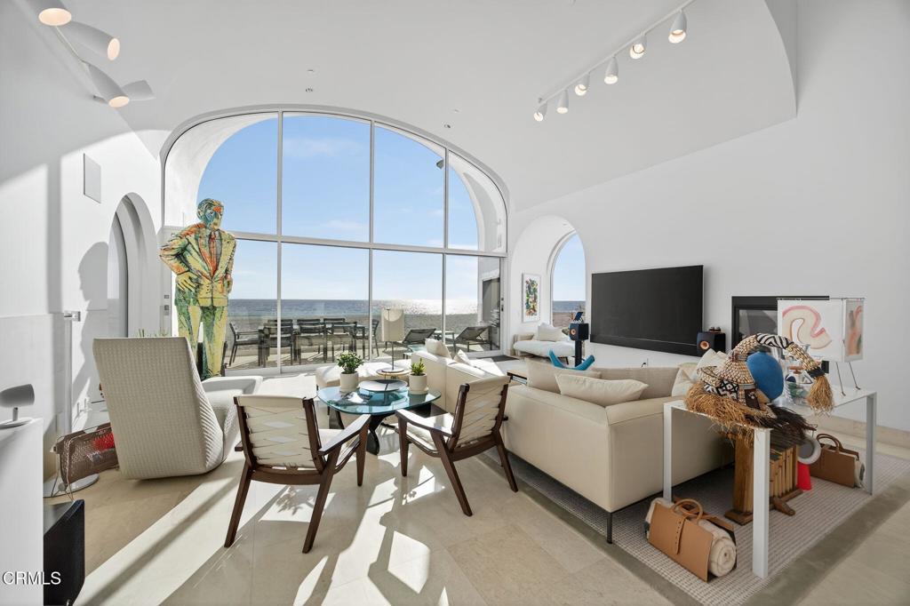 1211 Capri Way Oxnard, CA 93035 - Photo 18 of 63 a living room with furniture and a flat screen tv