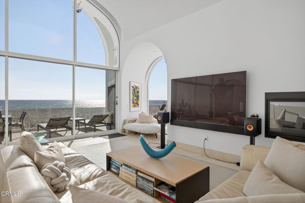 1211 Capri Way Oxnard, CA 93035 - Photo 20 of 63 a living room with furniture and a fireplace