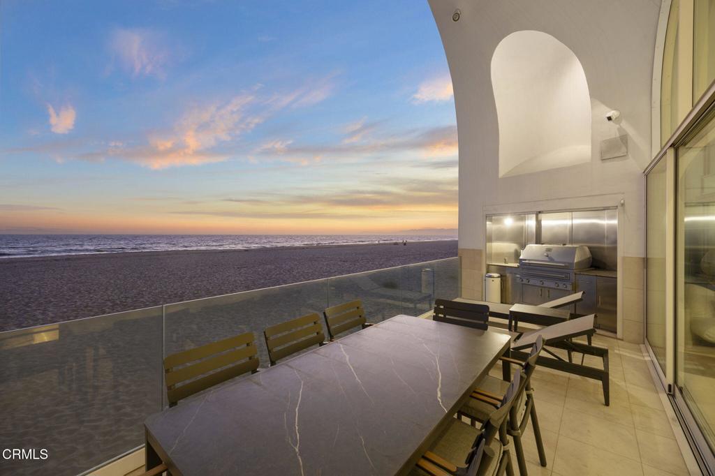 1211 Capri Way Oxnard, CA 93035 - Photo 24 of 63 a view of a balcony with chair and a potted plant