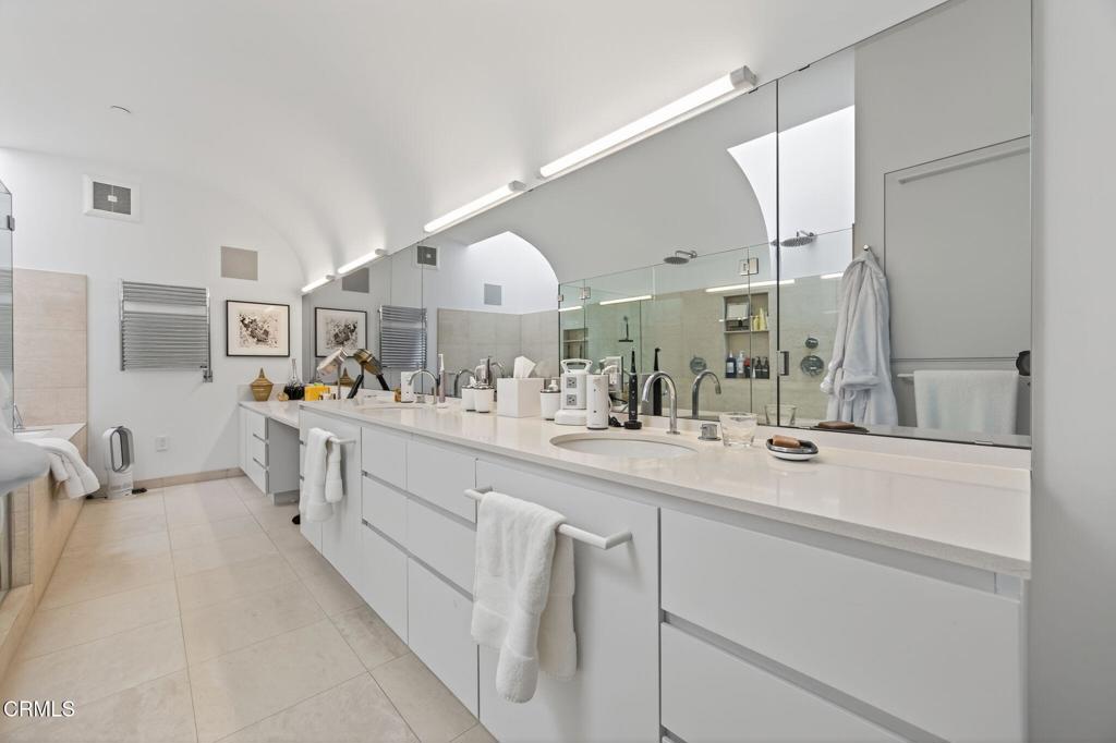 1211 Capri Way Oxnard, CA 93035 - Photo 36 of 63 a large white bathroom with double vanity and a mirror