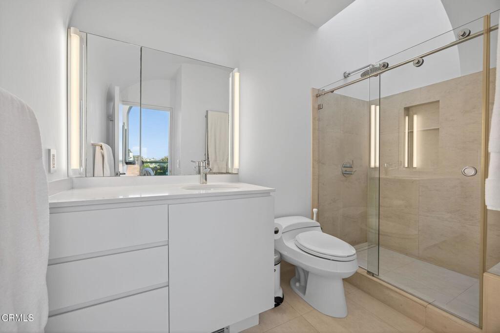 1211 Capri Way Oxnard, CA 93035 - Photo 43 of 63 a bathroom with a sink toilet and shower