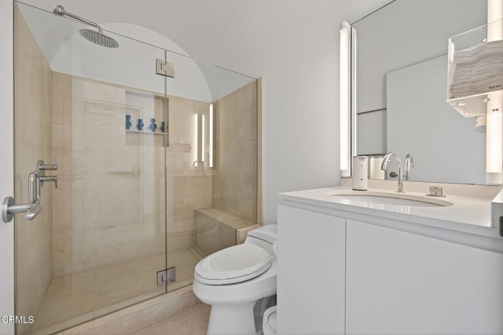 1211 Capri Way Oxnard, CA 93035 - Photo 50 of 63 a bathroom with a sink a toilet and shower