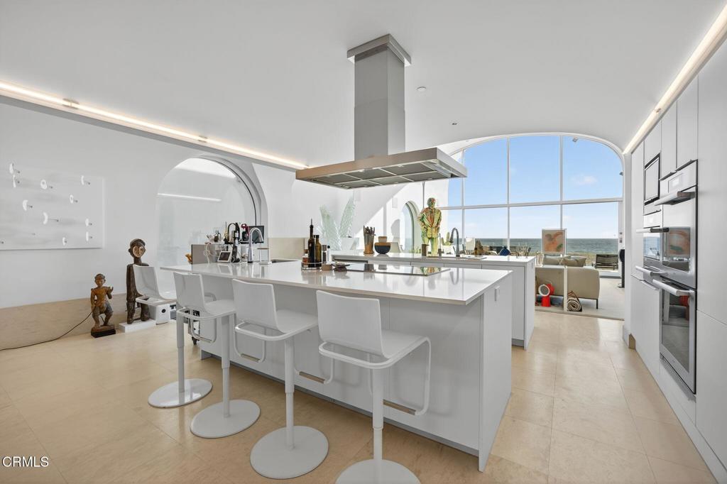 1211 Capri Way Oxnard, CA 93035 - Photo 6 of 63 a kitchen with counter top space cabinets and appliances