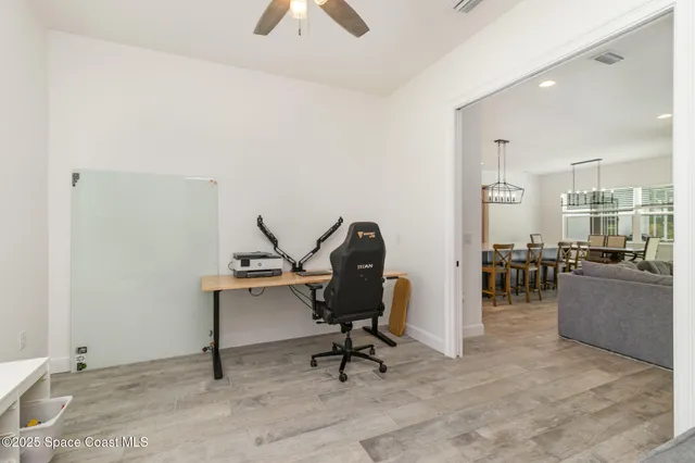 a view of a workspace with furniture