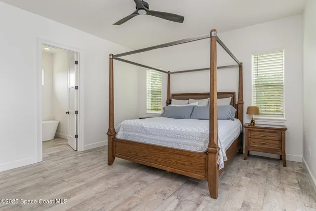 a bedroom with a bed and a closet